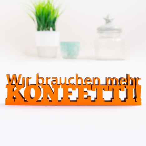 3D-Schriftzug Wir brauchen mehr Konfetti